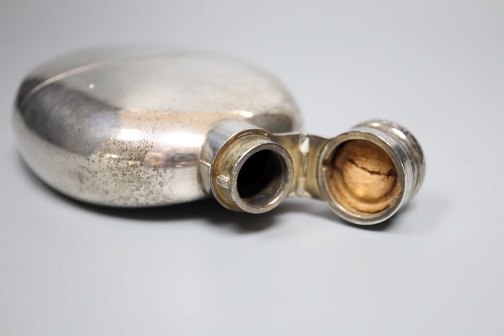 A late Victorian silver oval hip flask, Sampson Mordan & Co, London, 1895, 14.2cm, gross 7oz.